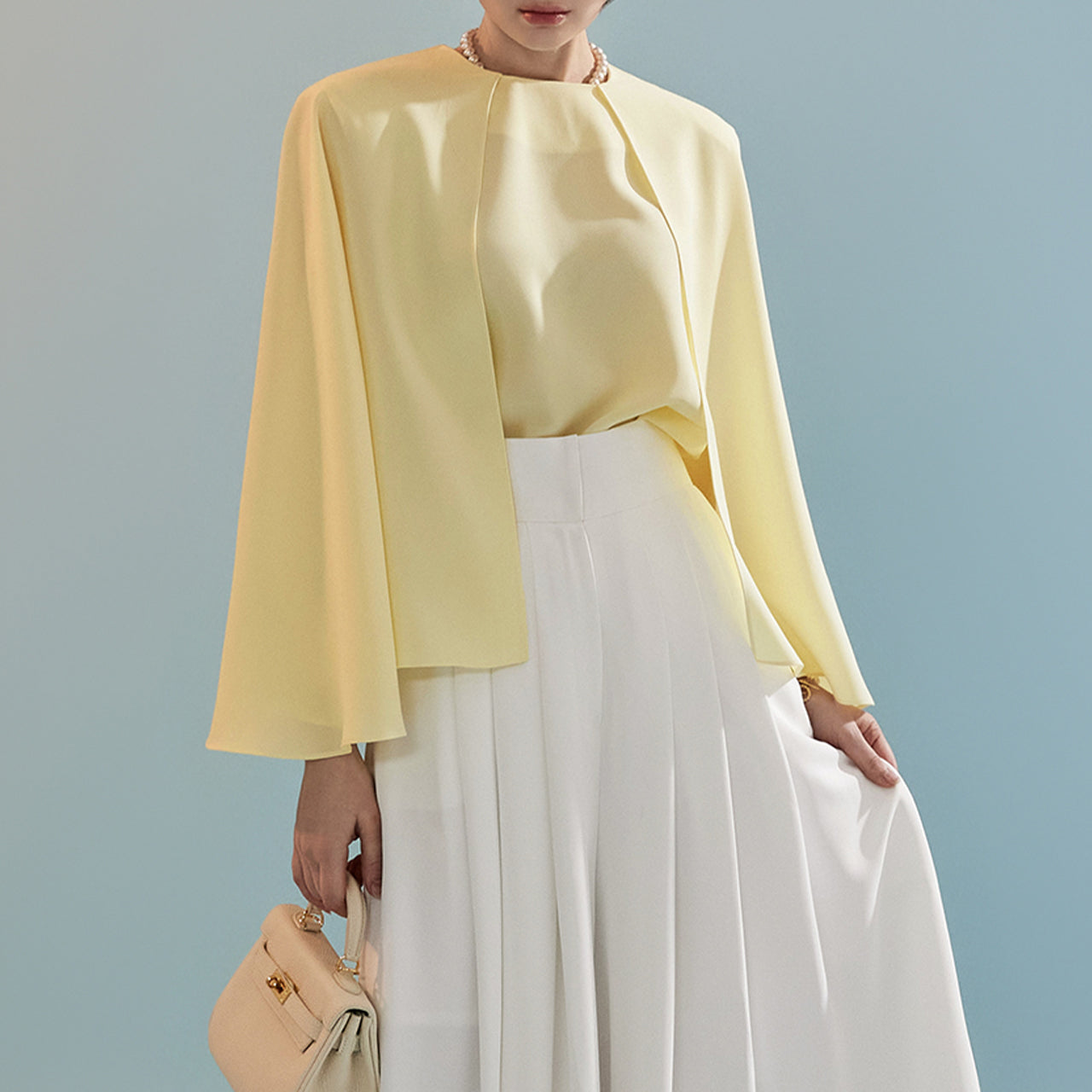 B2723 Sleeveless Cape Design Blouse